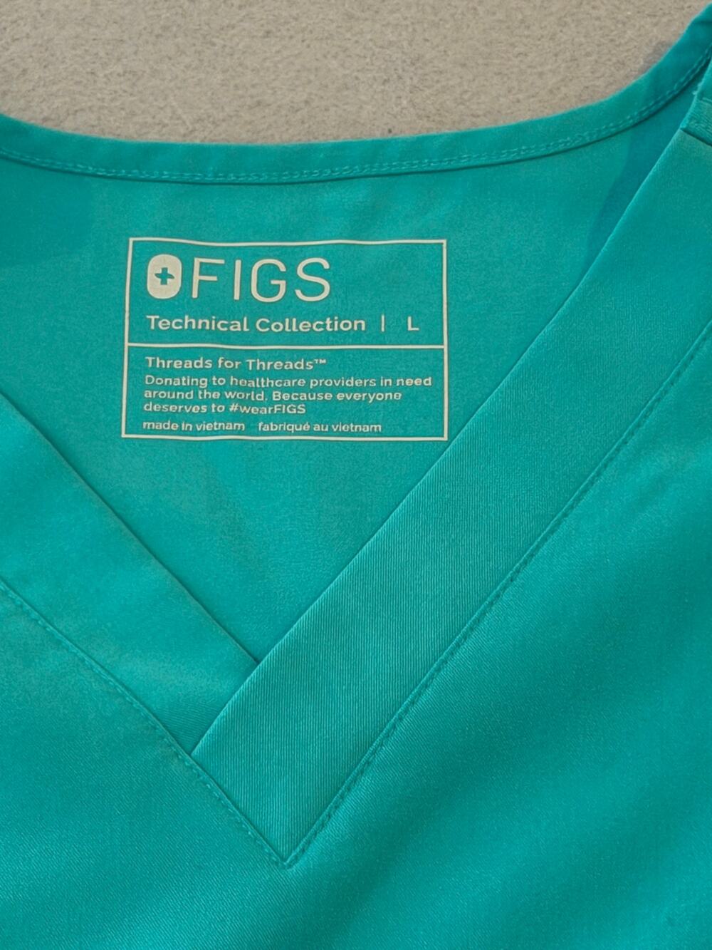 FIGS Technical Collection Scrub Top Women’s Large Teal Aqua V-Neck Pocket Nurse